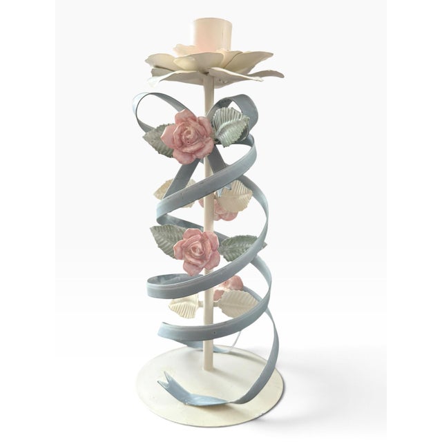 Whimsical vintage tole-style candlestick featuring a sculptural spiral ribbon motif wrapped around a slender central stem,...