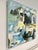 This bold abstract expressionist style oil painting features a mix of blue, yellow, black, and white colors in a free-form...
