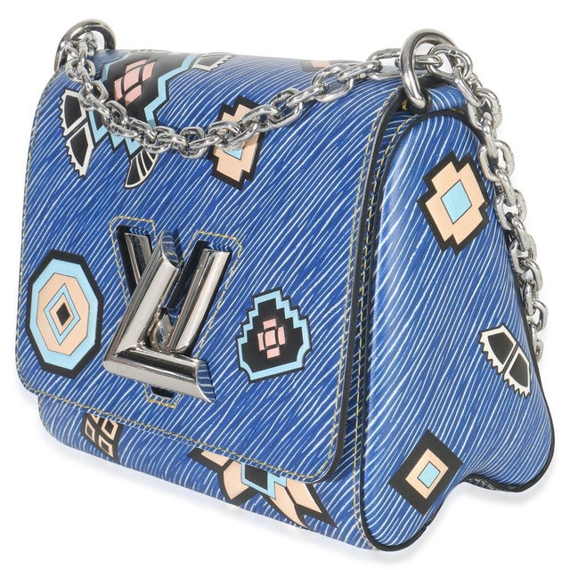 The Louis Vuitton Twist collection was unveiled in 2015. The accessory features a chunky monogram logo on the front for a...