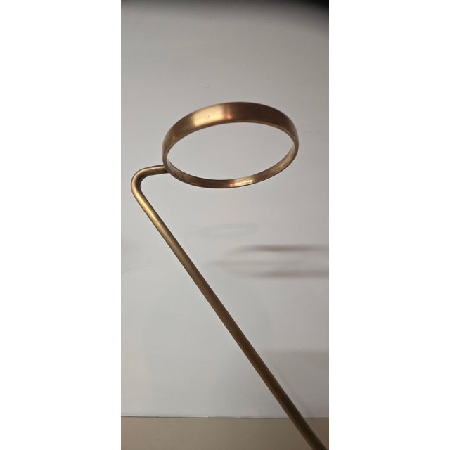 A standing ashtray in brass and copper attributed to the workshop of Carl Auböck (Vienna), retailed by Illums Bolighus,...