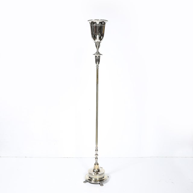 This stunning Classical Hollywood Regency silvered bronze torchiere, crafted in America circa 1945, exudes timeless...