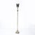 This stunning Classical Hollywood Regency silvered bronze torchiere, crafted in America circa 1945, exudes timeless...