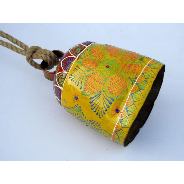 The bell is made of iron and coated primarily with copper, along with a few other metals. They are made from scrap iron...