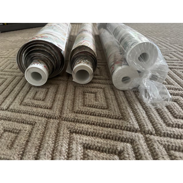 3 unused rolls plus 2 partially used rolls with excess cuttings. The paper has been stored carefully and is in excellent...