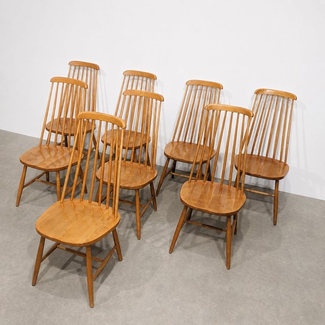 Set of 4 vintage scandinavian chairs from the 1960s-1970s, crafted in solid wood with a honey-toned varnished finish. the...