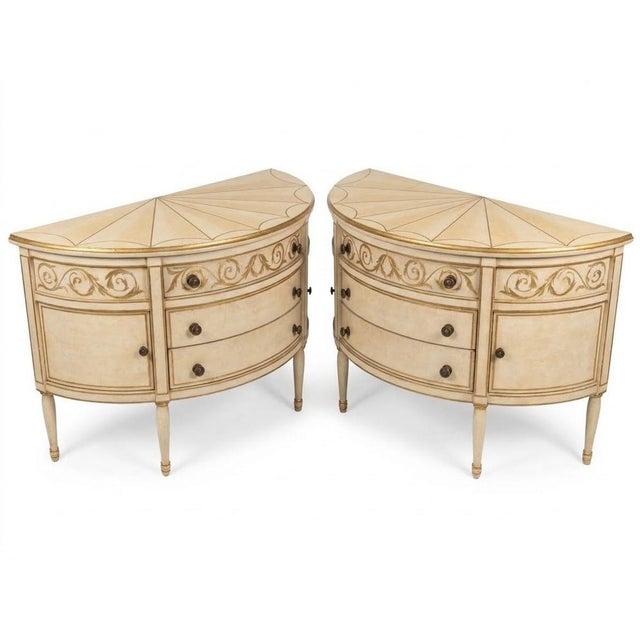 An exceptional offering of architectural symmetry and grand scale, this pair of custom Neoclassical demilune console...