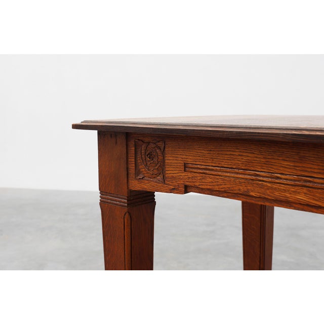 France / 1920 / Dining Table / Oak / Art Deco A rectangular dining table in full oak with carved designs on the frieze and...