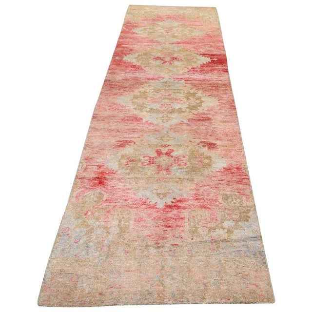Hand-knotted with care using traditional rug-making techniques, this wool rug blends timeless craftsmanship with a modern...