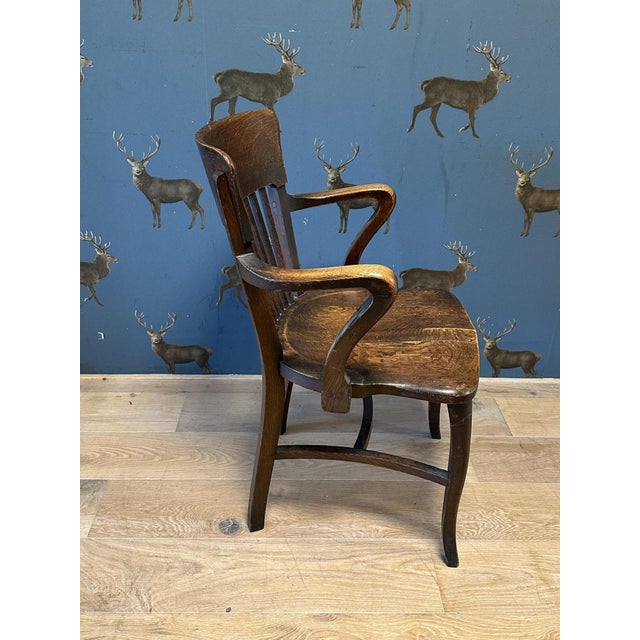 Oak office chair in good, original condition. Comfortable seat. Origin: England Period: Circa 1920