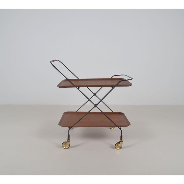 A Swedish vintage trolley designed in the 1960s by Paul Nagel. This metal serving trolley was produced by Jie Gantofta....