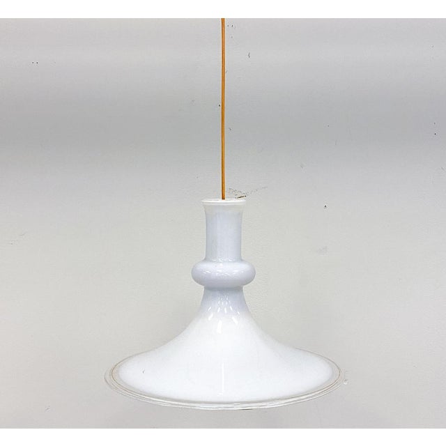 There is a quiet elegance to Scandinavian glass lighting that never goes out of style. This beautiful Holmegaard Etude...