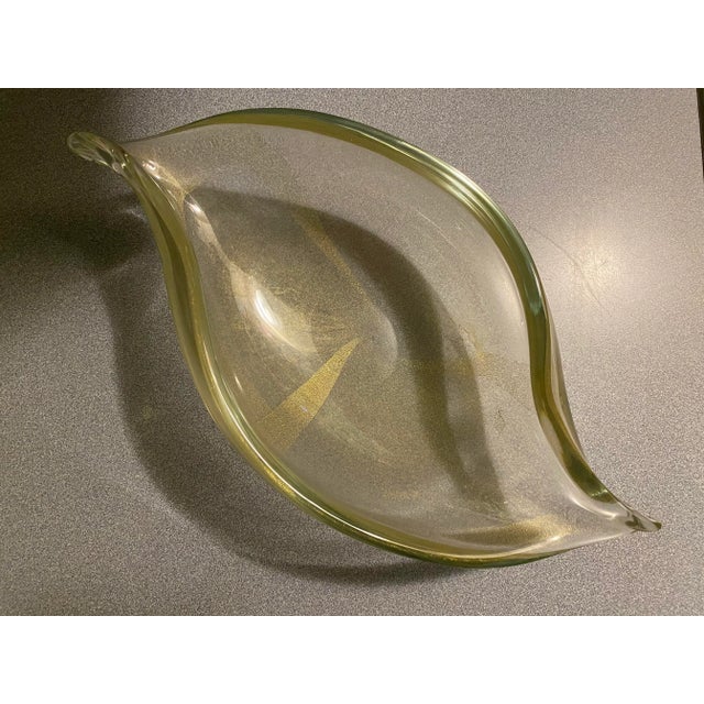 This is an absolutely beautiful and large Italian glass bowl. It is from the 1940s or 50s. It measures 13 1/2 inches wide....