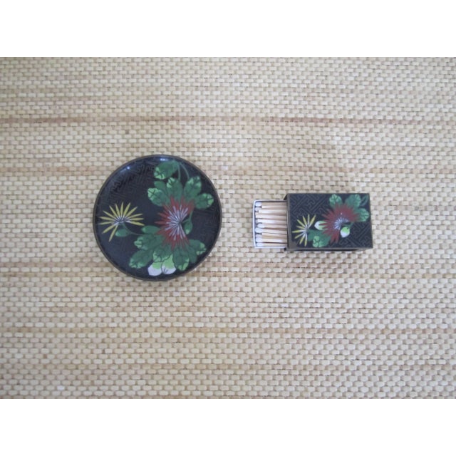 This is an early 20th century Chinese Cloisonné cigarette match box case set. Set includes 1 matchbox holder, and 1...