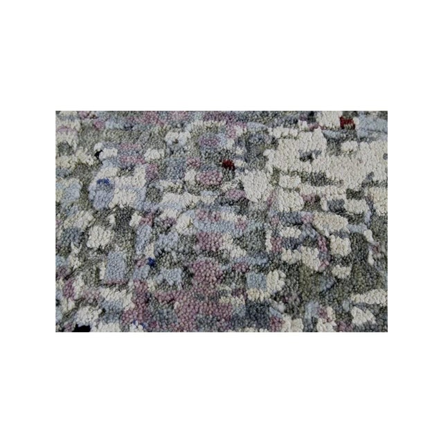 Elevate your decor with a 10x14 Modern Abstract Rug sourced from India, blending style and sophistication seamlessly.