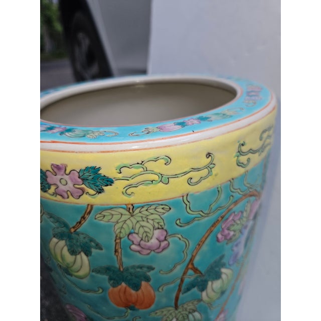 Pretty Aqua Umbrella Stand decorated with different fruit.. great colors and excellent condition.