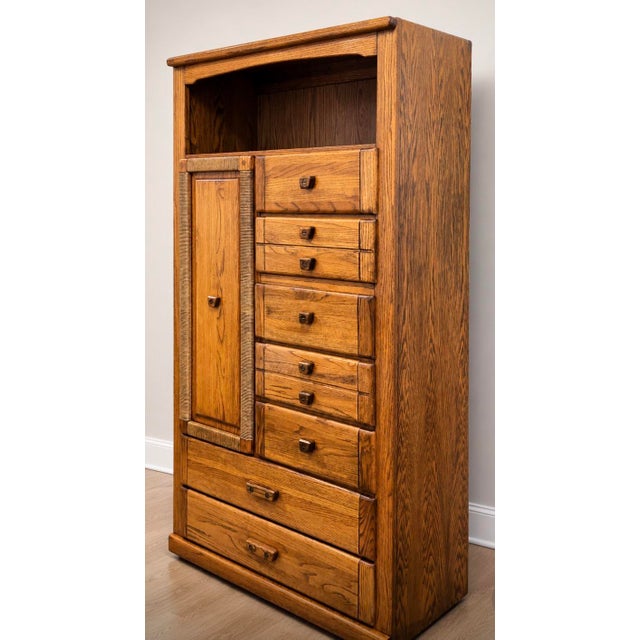 A beautifully crafted vintage Harrison bedroom set featuring a substantial gentleman’s chest paired with its original...