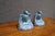 Rare pair of Rookwood Pottery figural rook bird bookends in a soft powder-blue glaze. Each stylized rook is perched in...