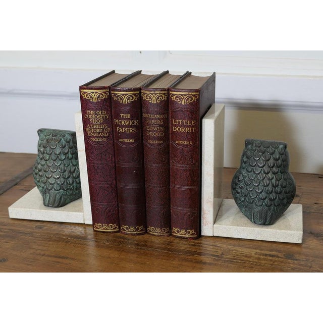 A Pair of Mid Century Marble and Bronze Bookends A very attractive set, the ends are heavy and made in marble, set on each...