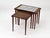 This is a set of three nesting tables originating from Denmark, produced during the 1960s. The design is characteristic of...