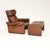 A stylish and incredibly comfortable vintage Italian leather reclining armchair and stool. They were made in Italy and...