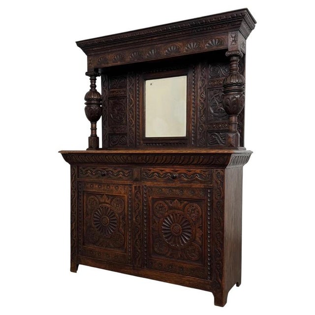 An impressive and finely crafted 19th-century English Victorian sideboard, constructed in oak and distinguished by its...