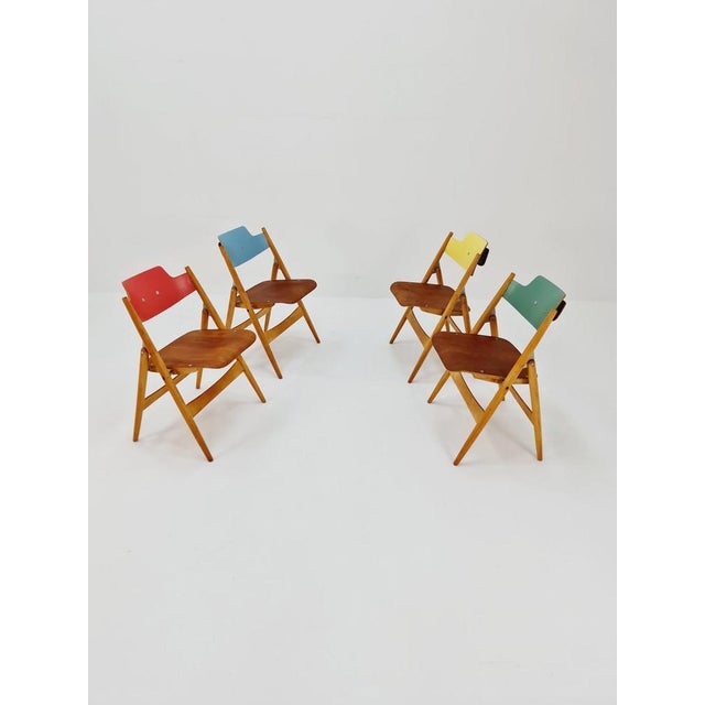 Austrian folding chair model SE18 by Egon Eiermann for Wilde & Spieth, 1950s Set of 4 Designer: Egon Eiermann...