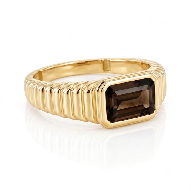 Add a touch of warm, grounded elegance to your everyday jewelry style with this striking statement ring. Expertly crafted...