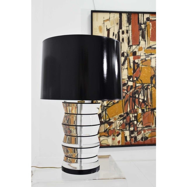 Illuminate your space with the Lucite and Acrylic Table Lamp by Clear-Lite, a striking piece that captures the essence of...
