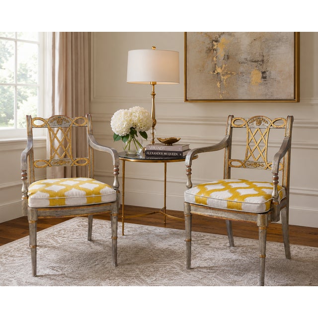 An elegant pair of Maitland-Smith armchairs showcasing the firm’s distinctive blend of neoclassical design and Hollywood...