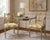 An elegant pair of Maitland-Smith armchairs showcasing the firm’s distinctive blend of neoclassical design and Hollywood...