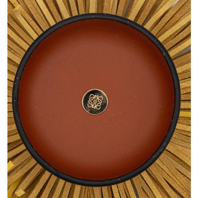 Loewe Tassel Box - Yellow - 4" A round ceramic box with a lid in calfskin and fringed leather. Lined in calfskin embossed...