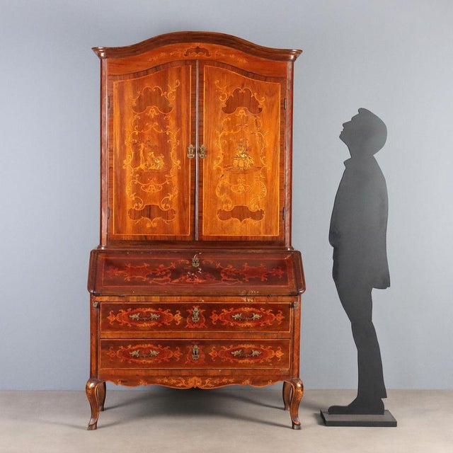 This Piedmontese walnut trumeau features an elegant blend of antique and 20th-century elements. The antique drop-leaf base...