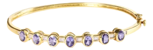 14K Yellow Gold Alternating Bezel Set 5MM Oval Shaped Tanzanite and 1/5 Cttw Diamond Bangle Bracelet - Fit's wrists up to 7.25"