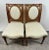 Pair of French Louis XVI-Style Carved Oak Side Chairs A refined pair of side chairs rendered in the classic Louis XVI...