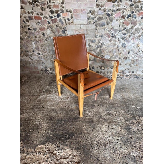 KK47000 Safari Chair in Ash with Cognac Leather by Kaare Klint for Carl Hansen & Søn, in Good conditions. Designed 1920 to...