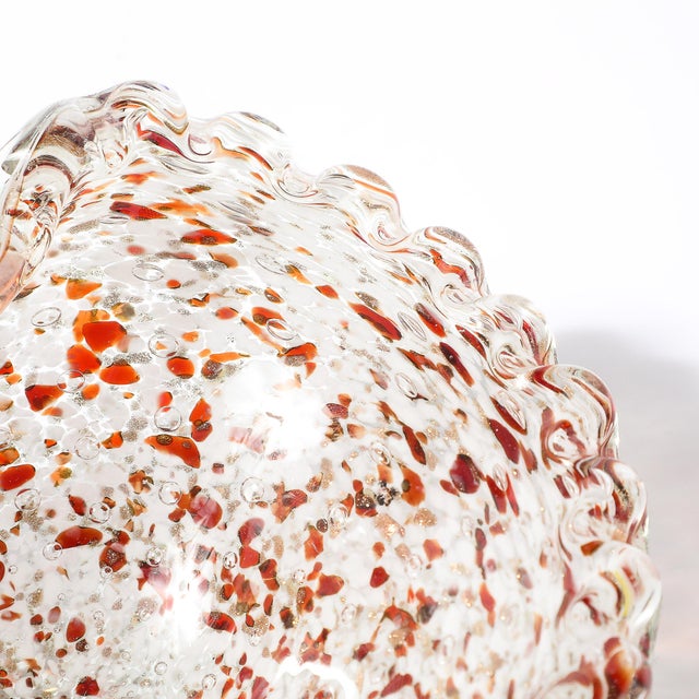 This Mid-Century Modernist Murano glass dish/ bowl exemplifies the innovative artistry of Murano glassmakers, famous for...