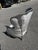 One single vintage painted and upholstered bergere chair. A soft distressed oyster silver finish with an aged patina,...