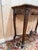 A louis xv style console table in finely carved solid walnut, dating from 1920 and originating from workshops in the...