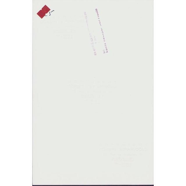 Paris Fashion, 1970s – Photograph by Gökşin Sipahioğlu Possibly featuring a design by André Courrèges This striking black-...