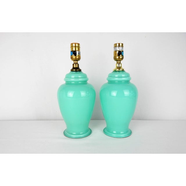 Pair of stunning Aqua Blue opaque glass Boudoir lamps. Original wiring in working order with turn switch socket. Will...