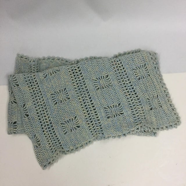 Nice and clean beautifully hand crocheted Throw. Small in size and perfect in every way. A mix of blue, yellow and pink...