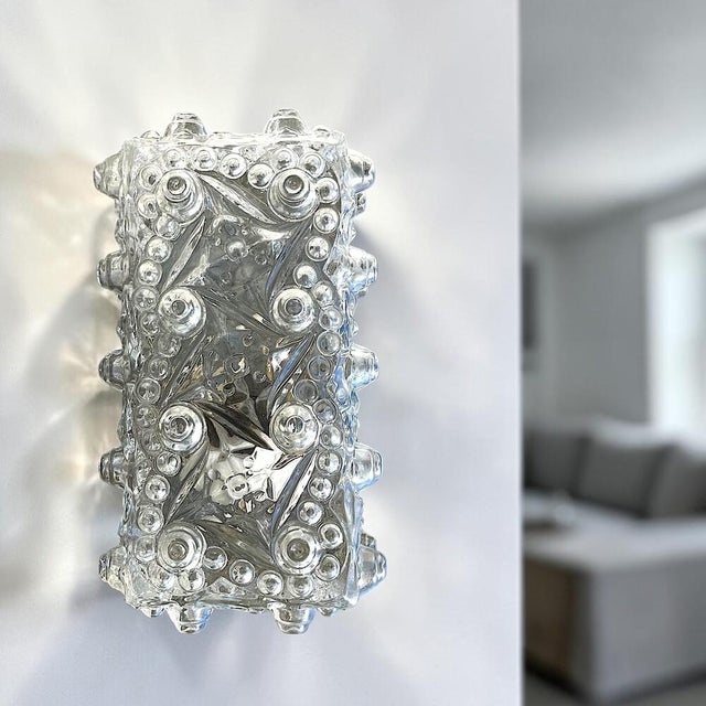 Luxuriously rich glass flush mount light that can be used as a wall or as a ceiling light. The glass lampshade is mounted...