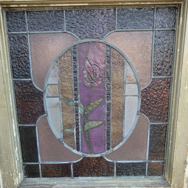 Antique Stained Glass Window Create a floral atmosphere in your bathroom with the soft rosey light of this stained glass...