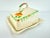 This charming butter dish, made in England, captures an artistic and whimsical essence through its hand-painted floral...