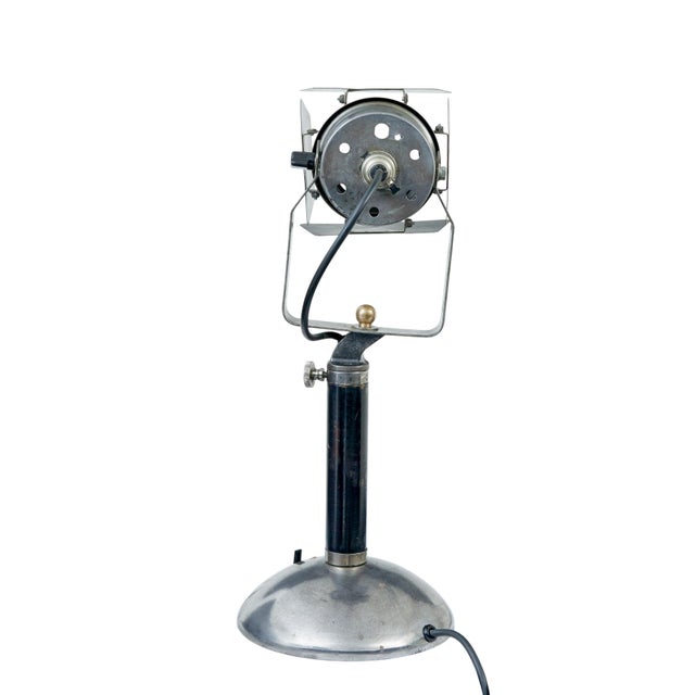 Unusual mid century adjustable industrial desk lamp circa 1950. Fine quality german made desk lamp in the form of a film...