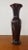 This is a Mid Century Royal Haeger Brown Glaze Black Spotted Vase. It measures 10" high and 3 3/8“ wide at the rim. The...