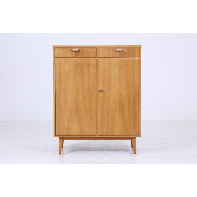 Beautiful mid-century chest of drawers from the 60s * High-quality workmanship * 2 doors with a key * 2 shelves * 2...