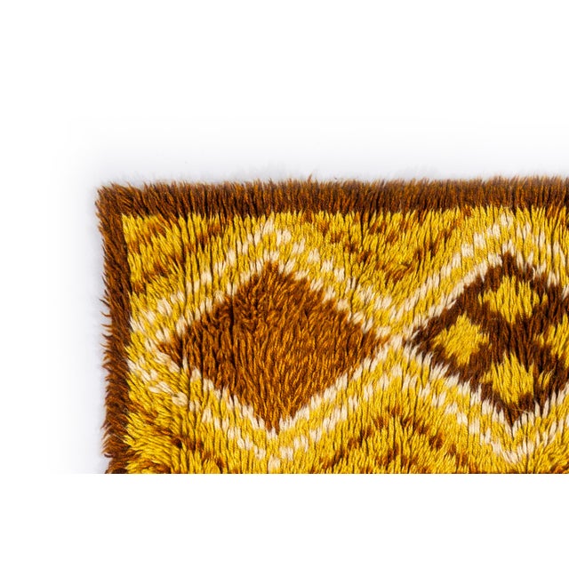 Scandinavian vintage rug. 104 x 43 cm (41 x 17 in). Rya (long pile/shag) technique, wool on wool. Tribal inspired...