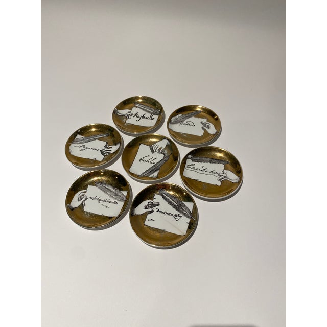 Set of Seven Vintage Italian Gilt Porcelain “Autografi” Coasters by Piero Fornasetti For Sale - Image 9 of 12