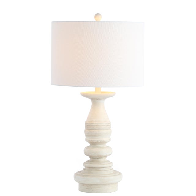 A rich blend of style and substance, this monumental table lamp makes a grand statement in any living room. Crafted in...